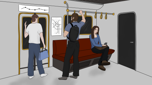 Mädchen sitzt in der U-Bahn und daddelt am Handy.